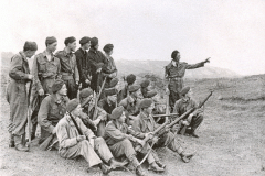 Summer Camp (on range on sand-dunes) 
Rear: Constable Keogh O'Sullivan Roach 
(ex-5th) Fisher Evans
Next Row: Jarvis Schofield Casey
Next Row: Tyson   ?   Walker Stephenson 
Bowen
Front Row: Brett Funnell Dennis Comley
Regt InstructorUnknown
