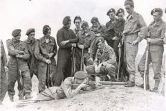 Summer Camp (on range on sand-dunes)
Long Comley Casey Fisher Stubbings Dennis 
Constable Roach Schofield Keogh Brett
In Firing Position:
Stephenson
Regt Instructor Unknown