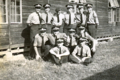 The 'lads' of Dl, back row, left to right, Tom Wilson John Higgs, LAA Bob Adkins, Ron Cooper, JJ and John Higgs. Middle row - now there you have me, the one on the left is Roy Barnes, but the others I can't remember. Front row is Campbell and A N Other